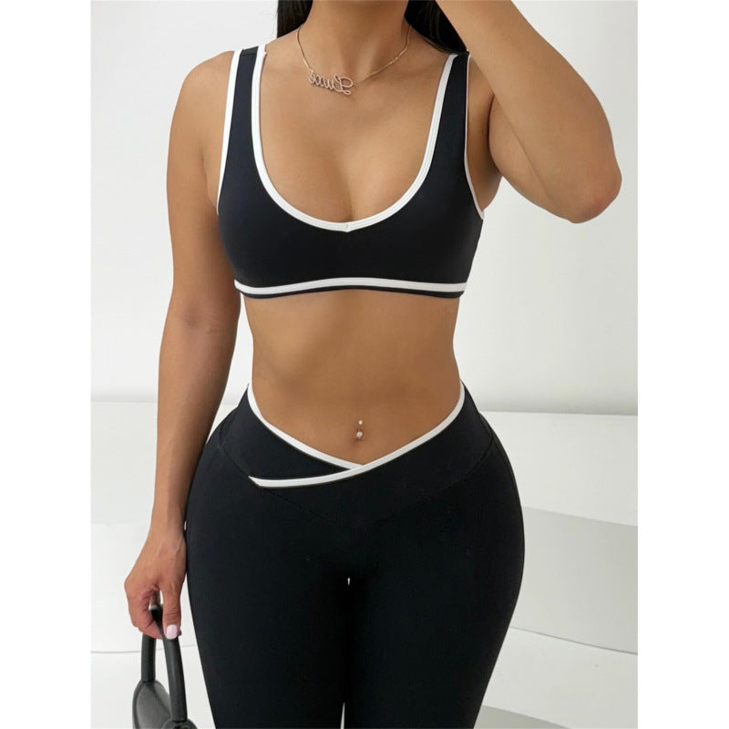 Damen Sportliches Zweiteiler Set mit kurzer Oberteil und flared Leggings Skovae
