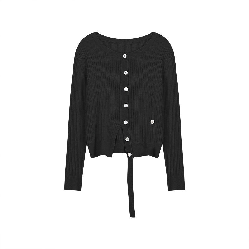 Dame cardigan med fint ribdesign og moderne knapdetaljer Stilla
