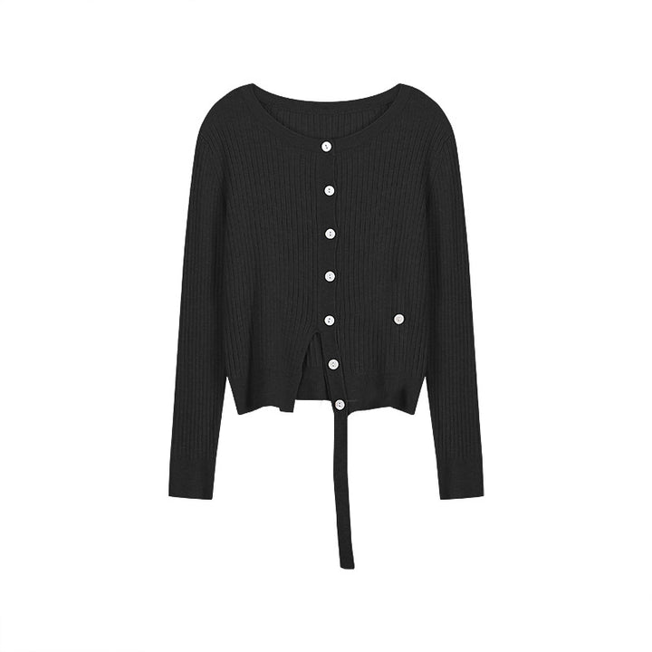 Dame cardigan med fint ribdesign og moderne knapdetaljer Stilla