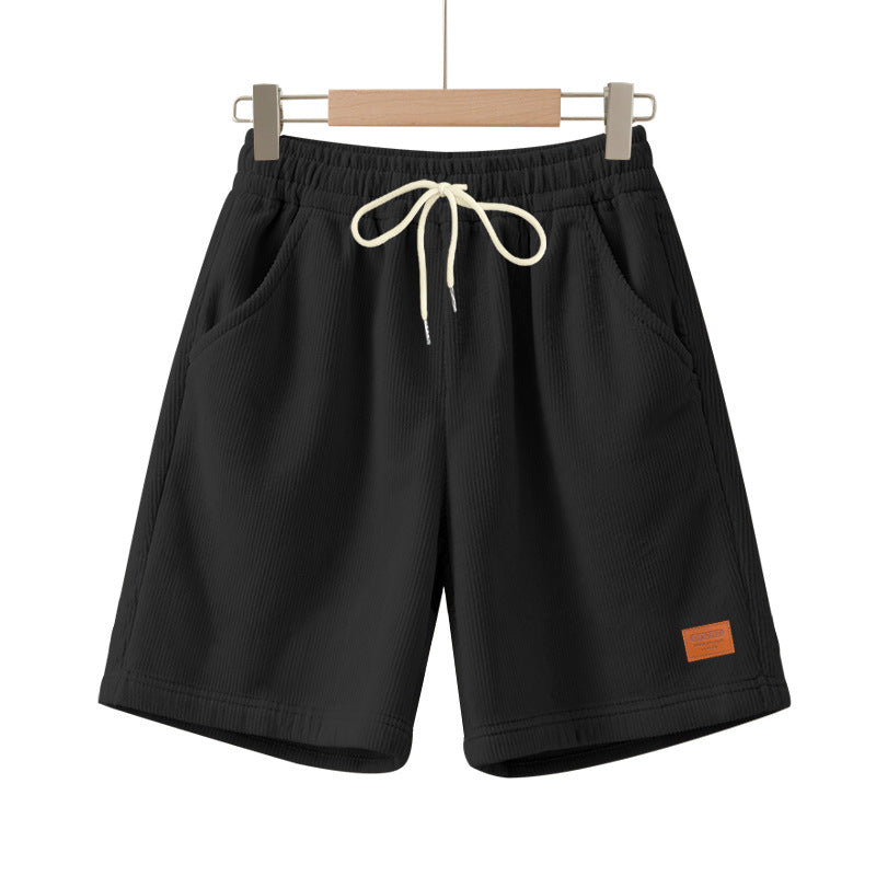 Herrer nan casual Bermuda shorts lavet af fint struktureret bomuldsblanding med elastisk talje og snor.