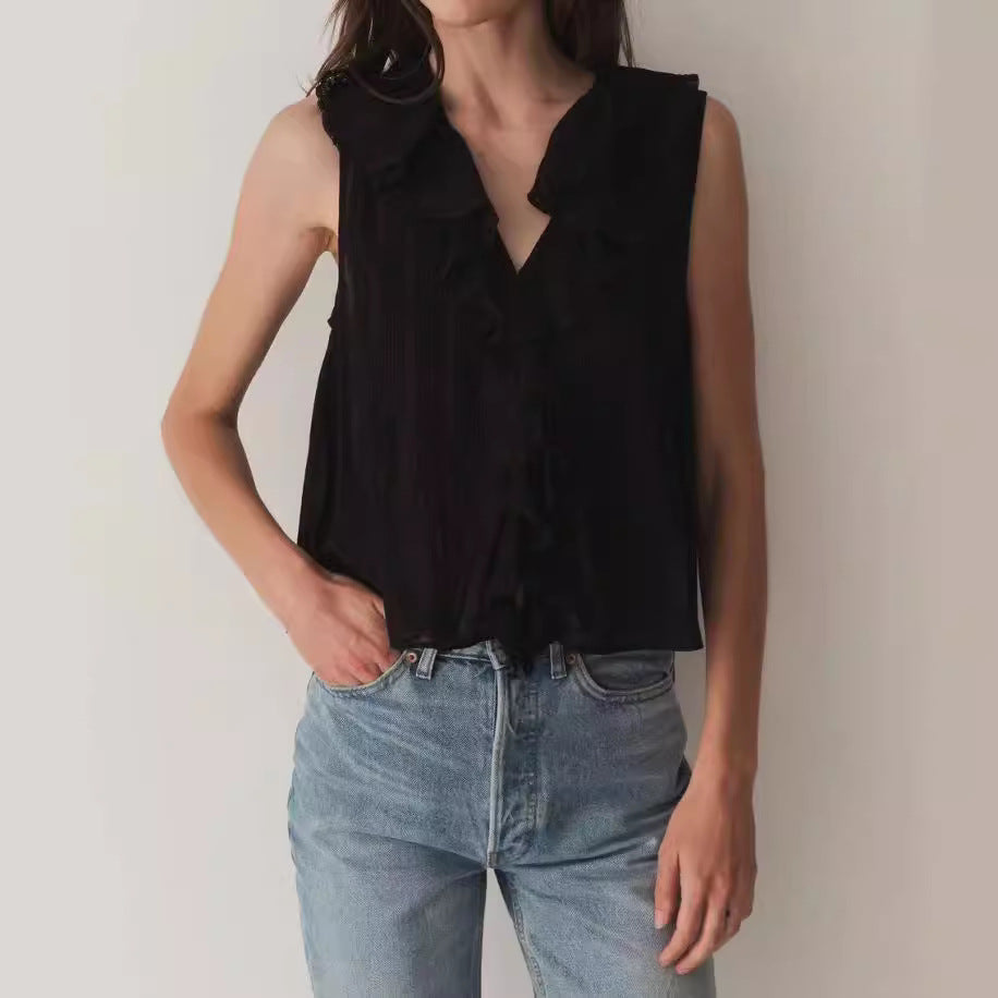 Dame ærmeløs top med friske flæse-detaljer og elegant knapliste Stilla