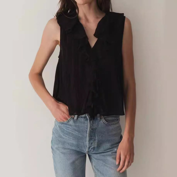 Dame ærmeløs top med friske flæse-detaljer og elegant knapliste Stilla