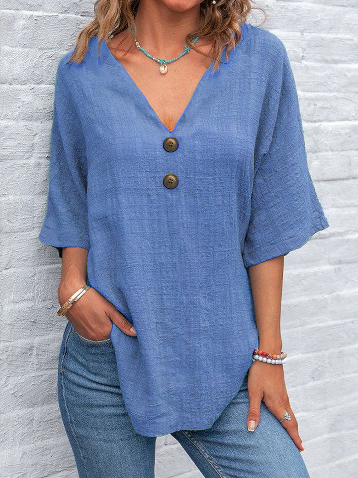 Dame V-hals bluse med knapdetaljer Skovae
