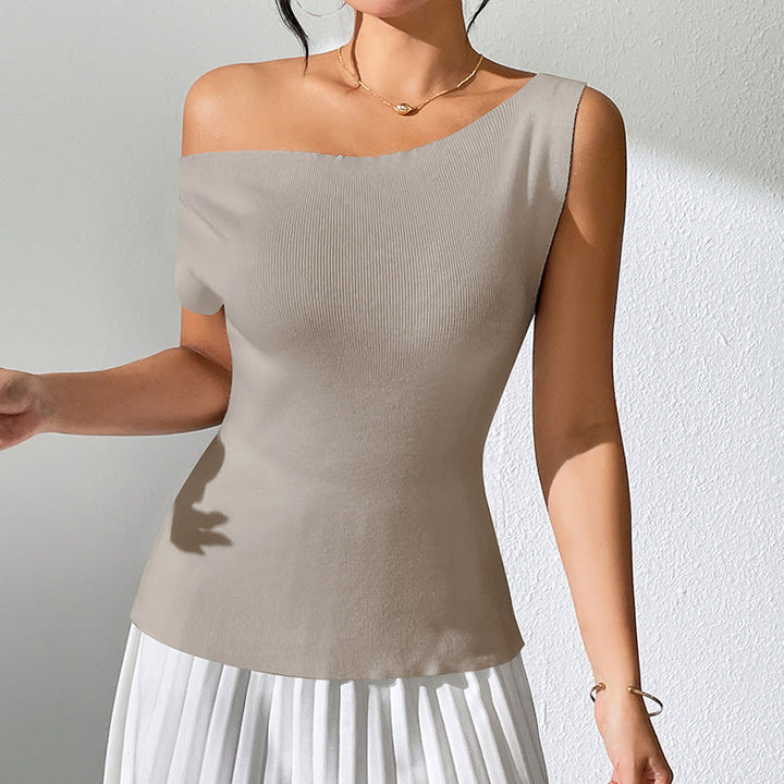 Skovae | Ensfarvet ærmeløs top med off-the-shoulder strikkedesign