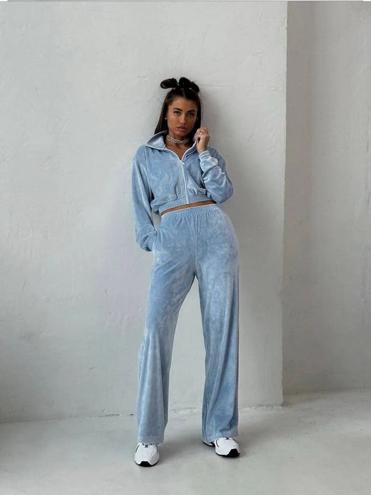 Kvinders fashionable velour sportsdragt med halv lynlås og elastiske manchetter Skovae