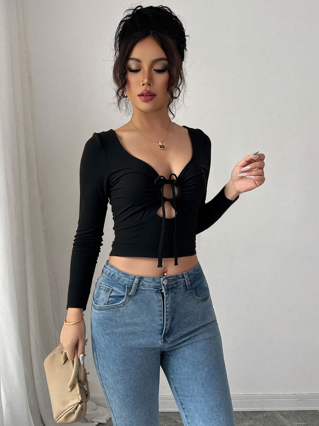 Kvinders crop top med dekorativ knude og lange ærmer Stilla