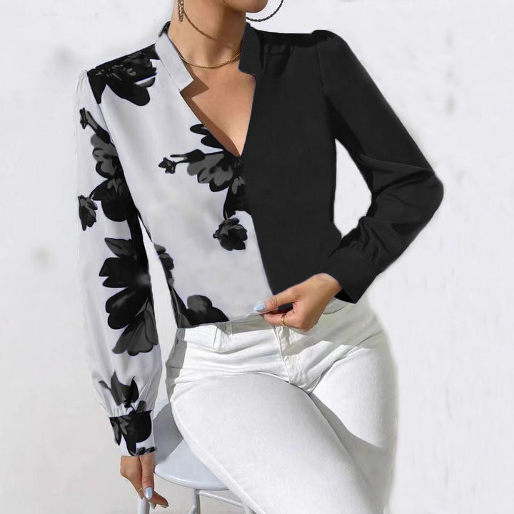 Damebluse med asymmetrisk snit og blomstermotiv Stilla