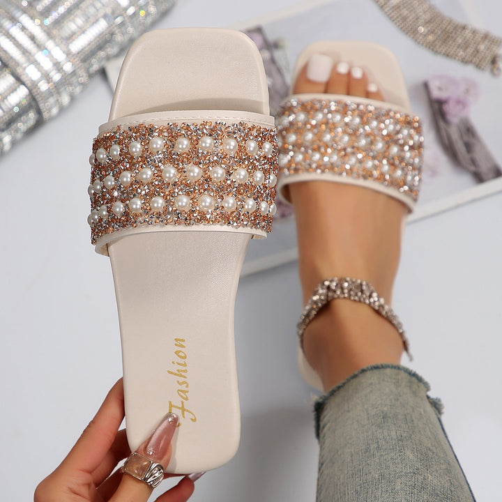 Dame pantoletten med glitrende perle-detaljer og komfortabel sål Stilla
