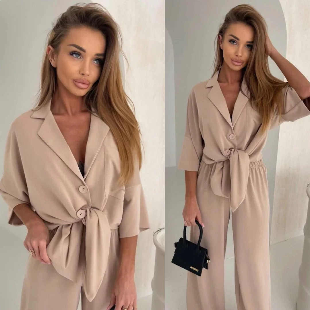 Kvinders afslappede jumpsuit med bælte og bredskårede ben