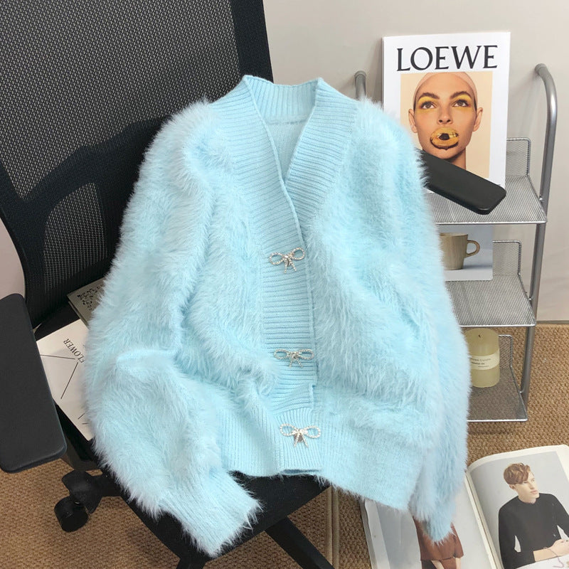 Kvinders fluffy cardigan med elegant knapdekoration Stilla