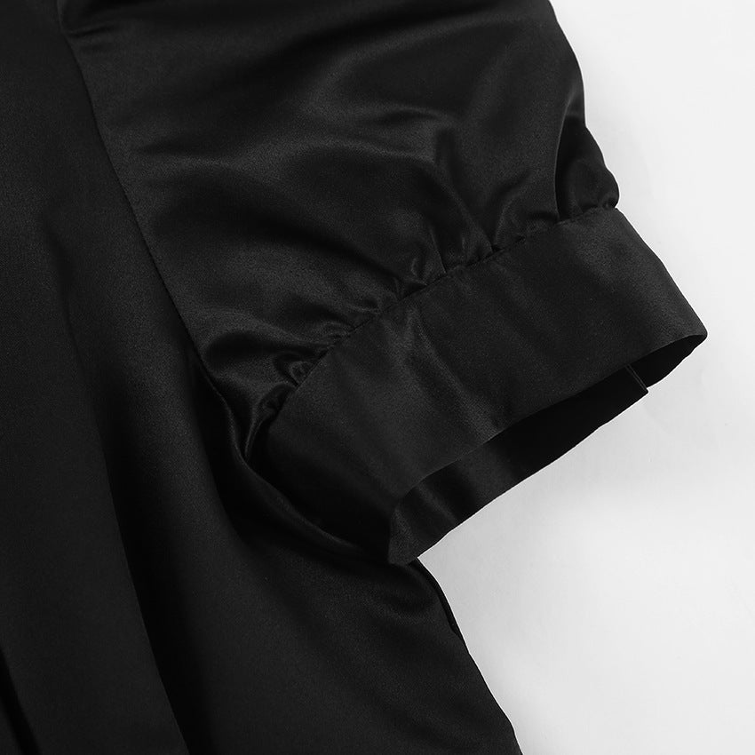 Dame Minikjole med voluminøse puffærmer og elegant knapdesign Stilla