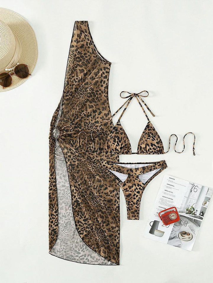 Dame triangel-bikini med moderne halterneck-top og gennemsigtig sarong drape