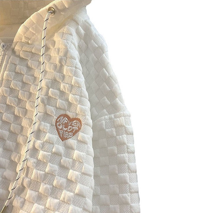 Dame hoodie jakke lavet af struktureret materiale med praktiske lommer og fashionable design