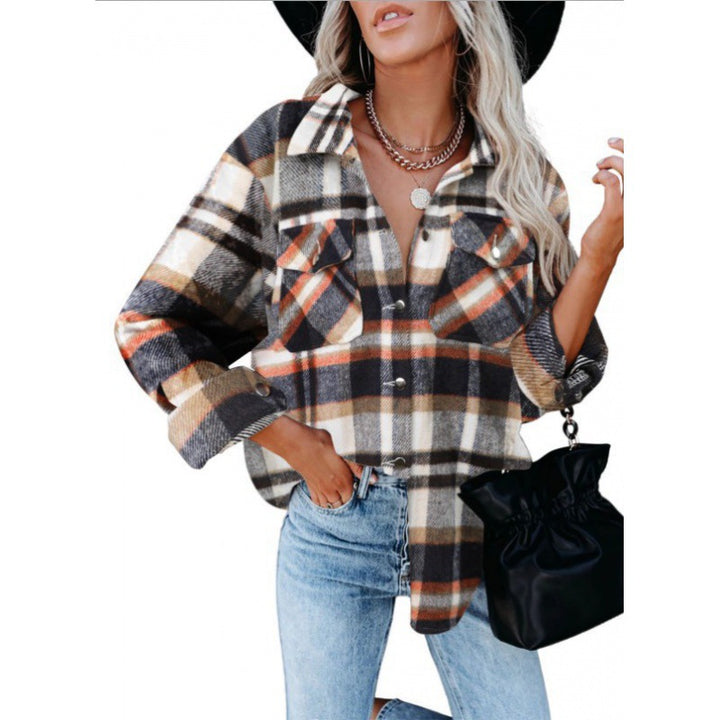 Dame ternet bluse i afslappet oversized stil med lommer Stilla