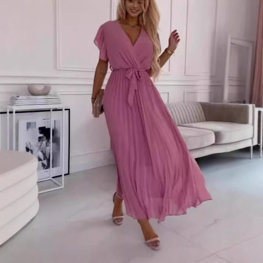 Dame maxikjole med elegant omslagsdesign og svajende flæserkirtel Stilla