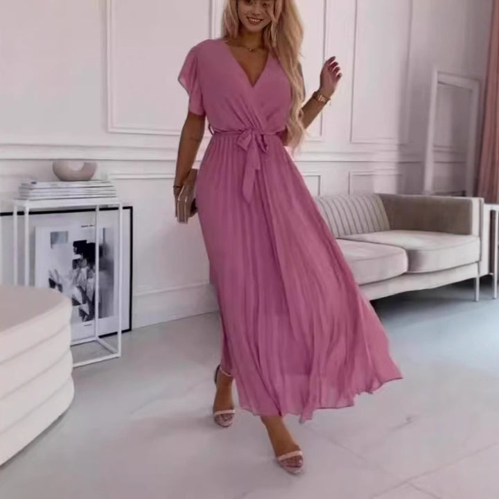 Dame maxikjole med elegant omslagsdesign og svajende flæserkirtel Stilla