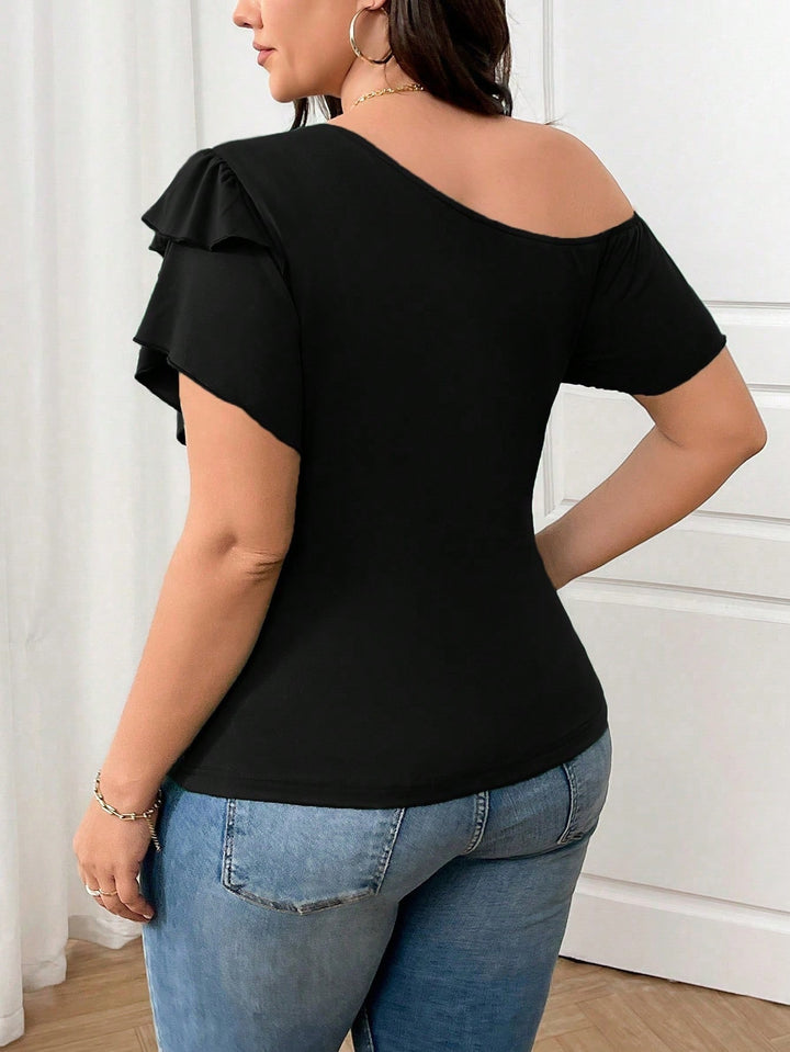 Dame asymmetrisk top med volangdetaljer Stilla