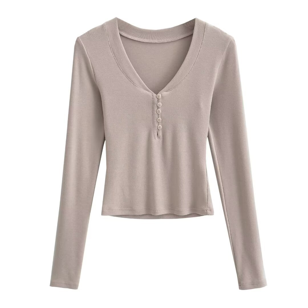 Dame Langærmet Henley T-shirt med elegant V-udskæring og fashionable knapdetalje Stilla
