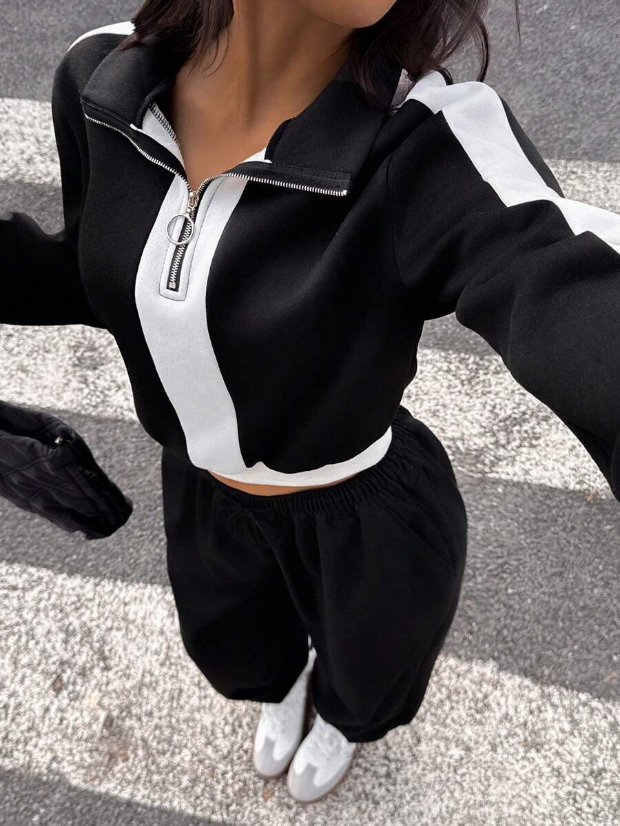 Kvinders casual hoodie med halvlukning og brede joggers Skovae