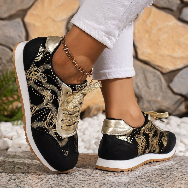 Damemode Sneakers med blomsterdesign og skinnende accenter Stilla