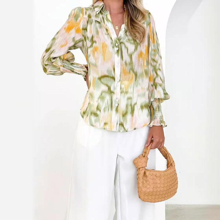 Damebluse med elegant farveovergang og trendy pufærmer Stilla