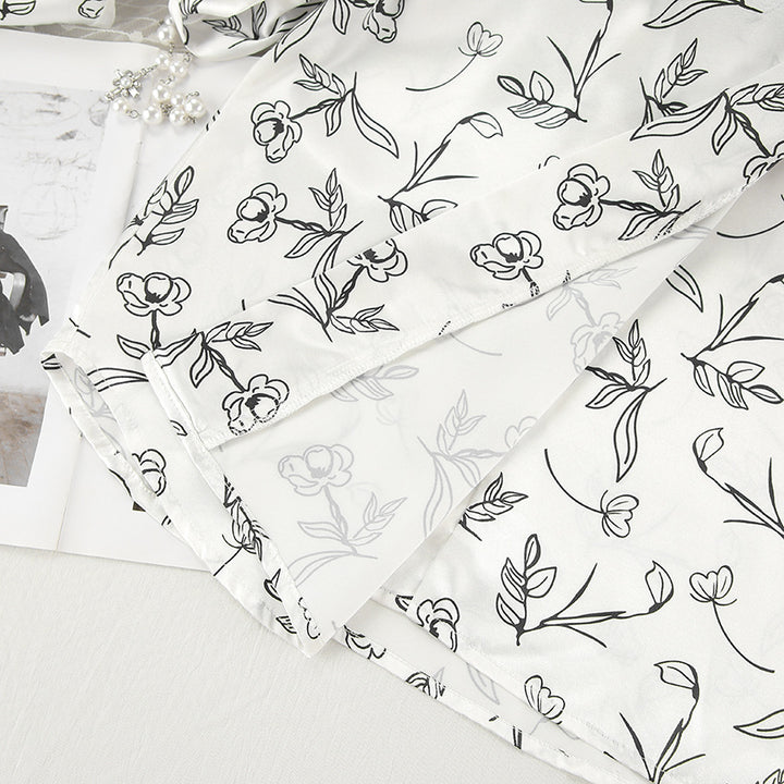 Dame pyjamasæt med detaljeret blomsterdesign og luftig pasform Stilla