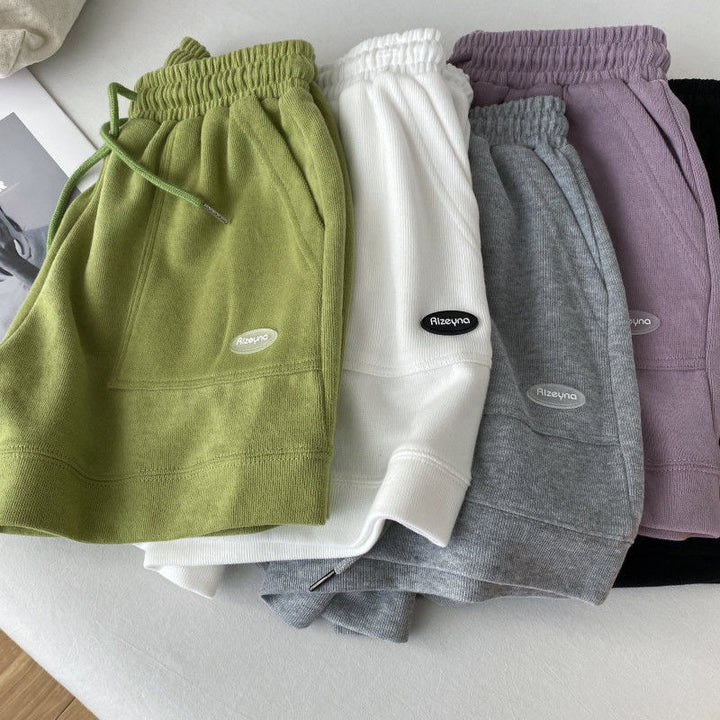 Kvindernes afslappede joggingshorts med elastisk talje og praktiske sidelommer