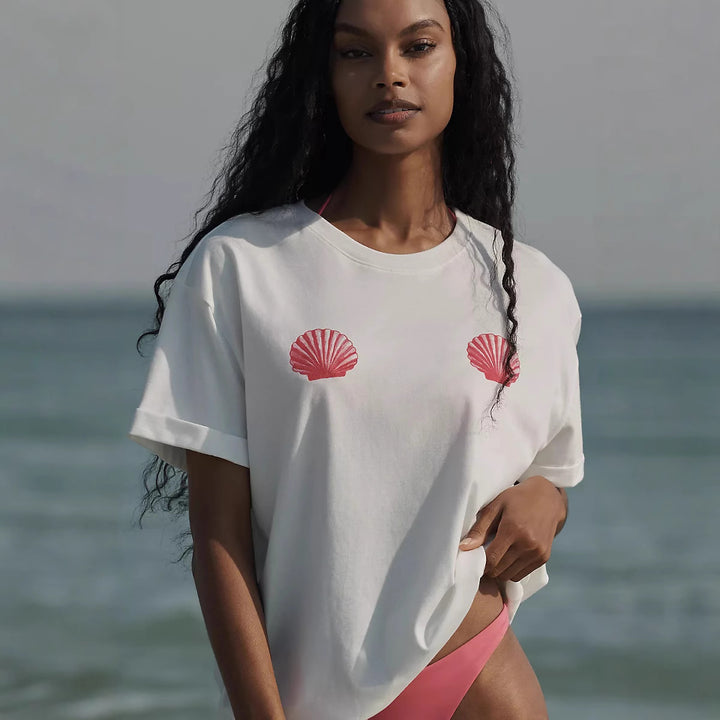 Dame afslappet T-shirt med maritimt muslingemotiv og løs pasform Skovae
