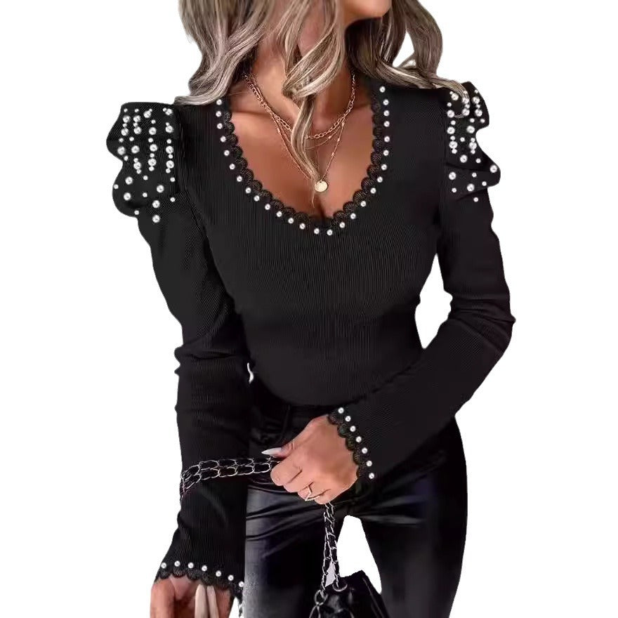 Dame top med skinnende perler og flæsedetaljer Stilla