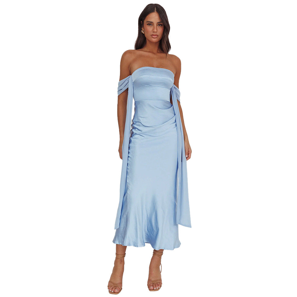 Kvindernes aftenkjole med off-the-shoulder design og flydende satinSkovae