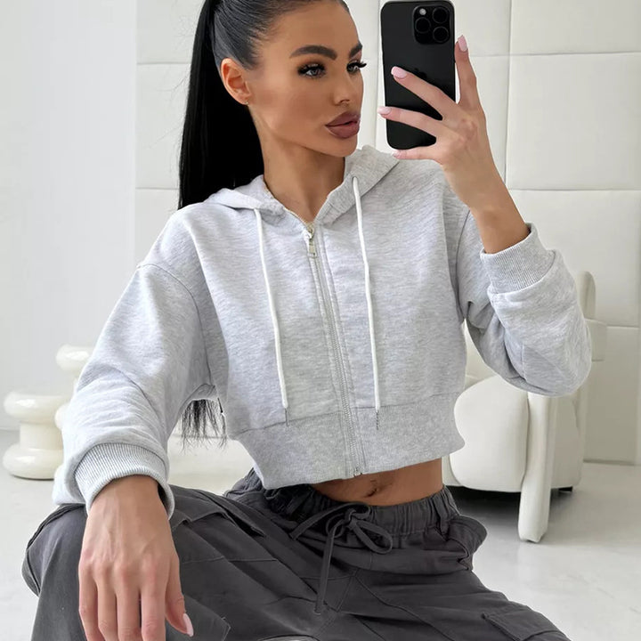 Kvinders cropped hoodie med lynlås og sidelommer Skovae