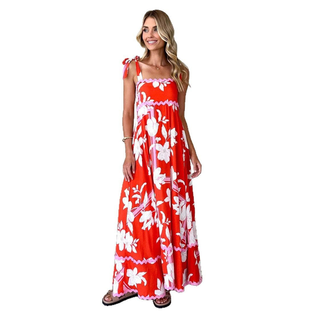 Kvinders maxi kjole med legende stropdesign og elegant print Stilla