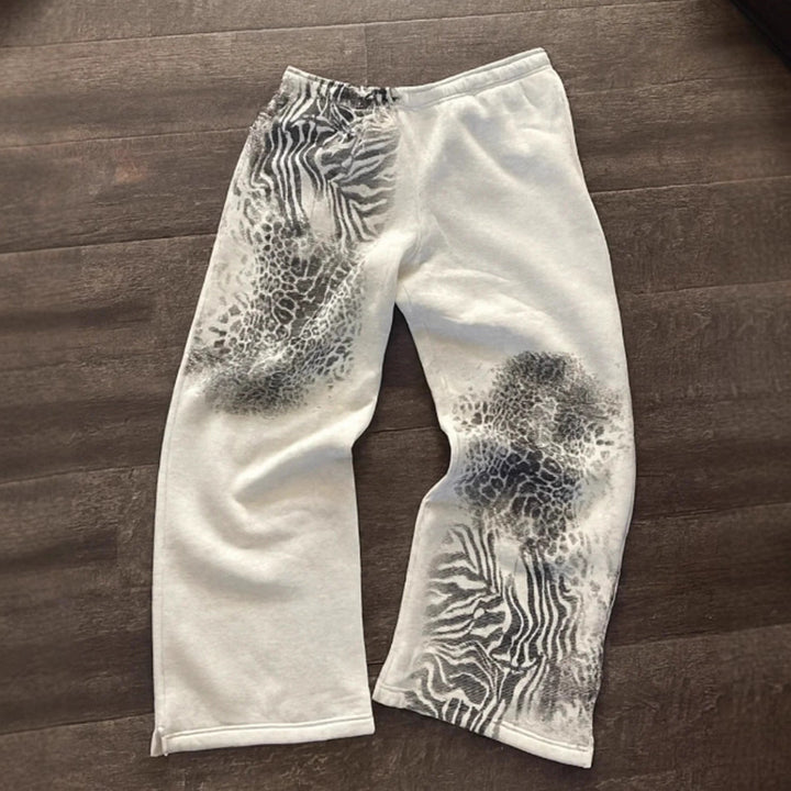 Dame nan løse sweatpants med asymmetrisk dyreprint, elastisk komfortlinning og lige ben Skovae