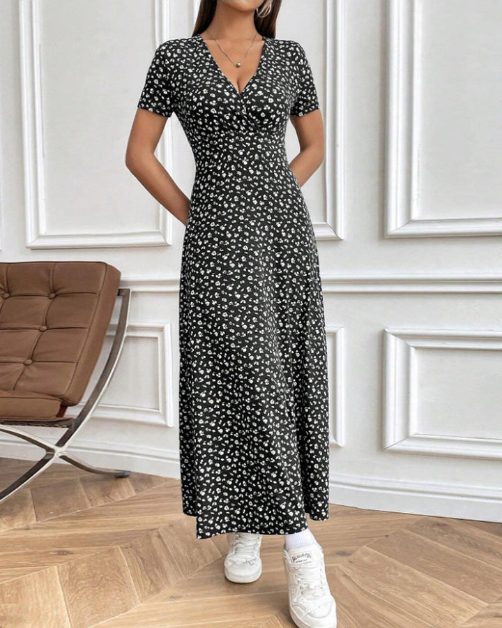 Dame nan taillérisk Jersey-midi kjole med crossover-overdel, korte ærmer og udstillet skirt Skovae