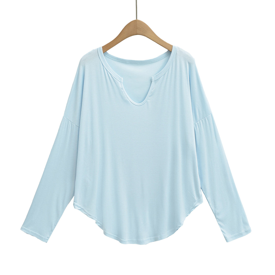 Dame afslappet longsleeve top med dyb v-hals og løstsiddende snit Stilla