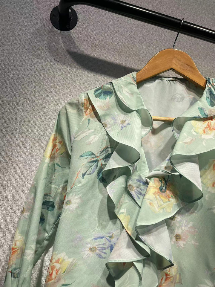 Dame ruffles blouse med floral design og elegante detaljer Stilla