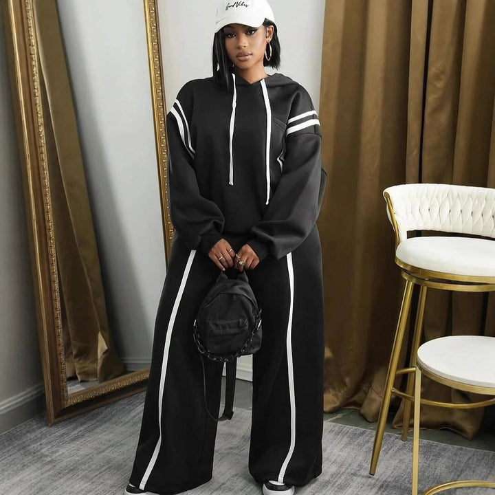 Kvinders sporty hoodie og bukser med brede ben med elegante striber