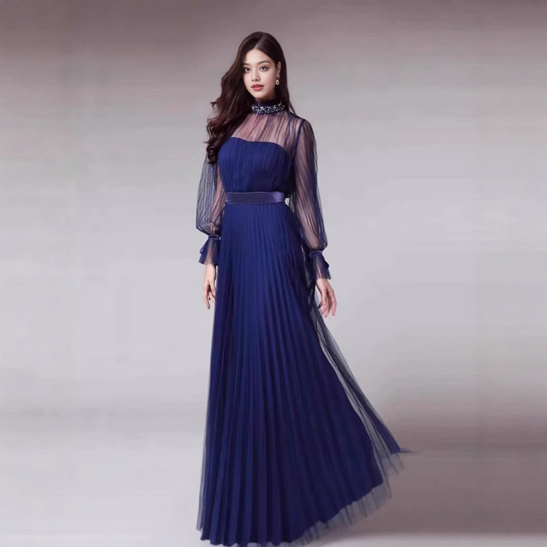 Kvindernes elegante maxi kjole med glitrende chiffon og legende flæse detaljer Skovae