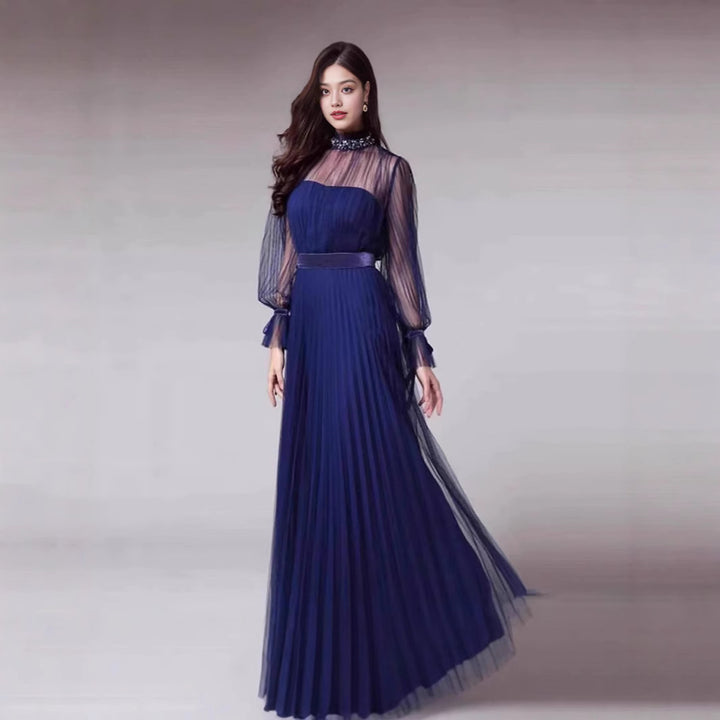 Kvindernes elegante maxi kjole med glitrende chiffon og legende flæse detaljer Skovae