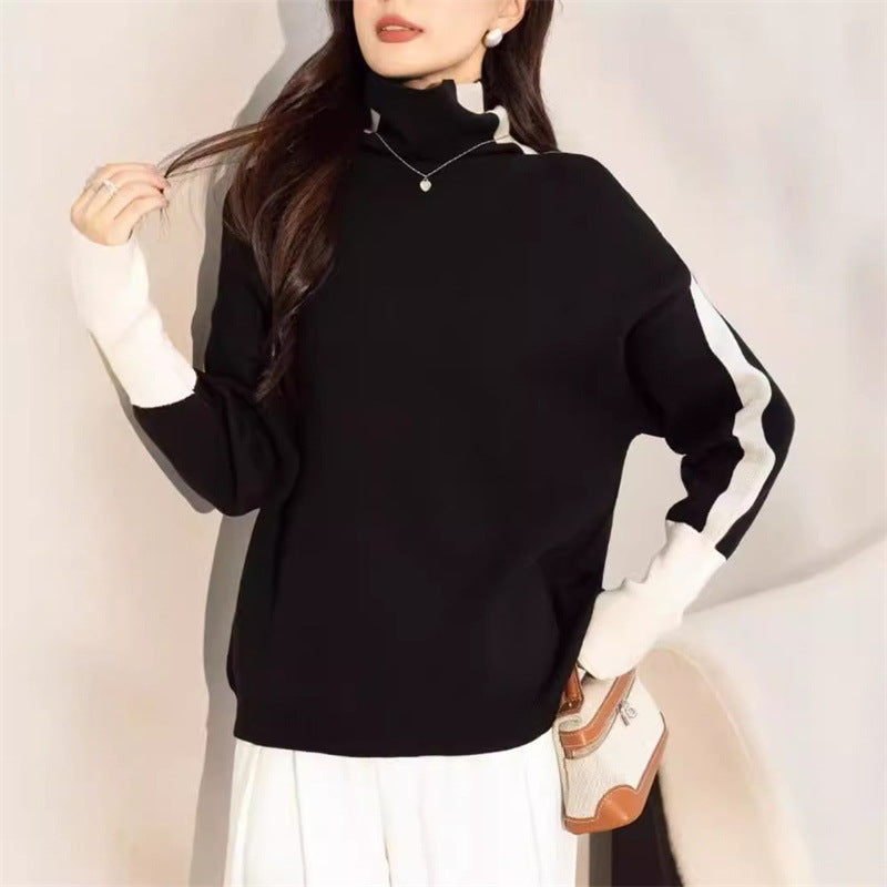 Kvinders oversized sweater med moderne turtleneck og kontrasterende ærme accenter Stilla