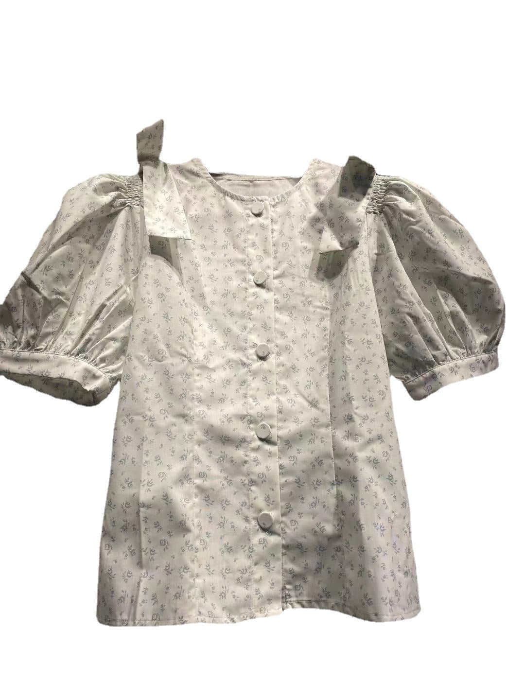 Damebluse med volumniøse puffærmer og elegante sløjfer Stilla