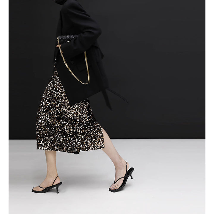 Dame glitrende midi nederdel med fint glitrende design Stilla