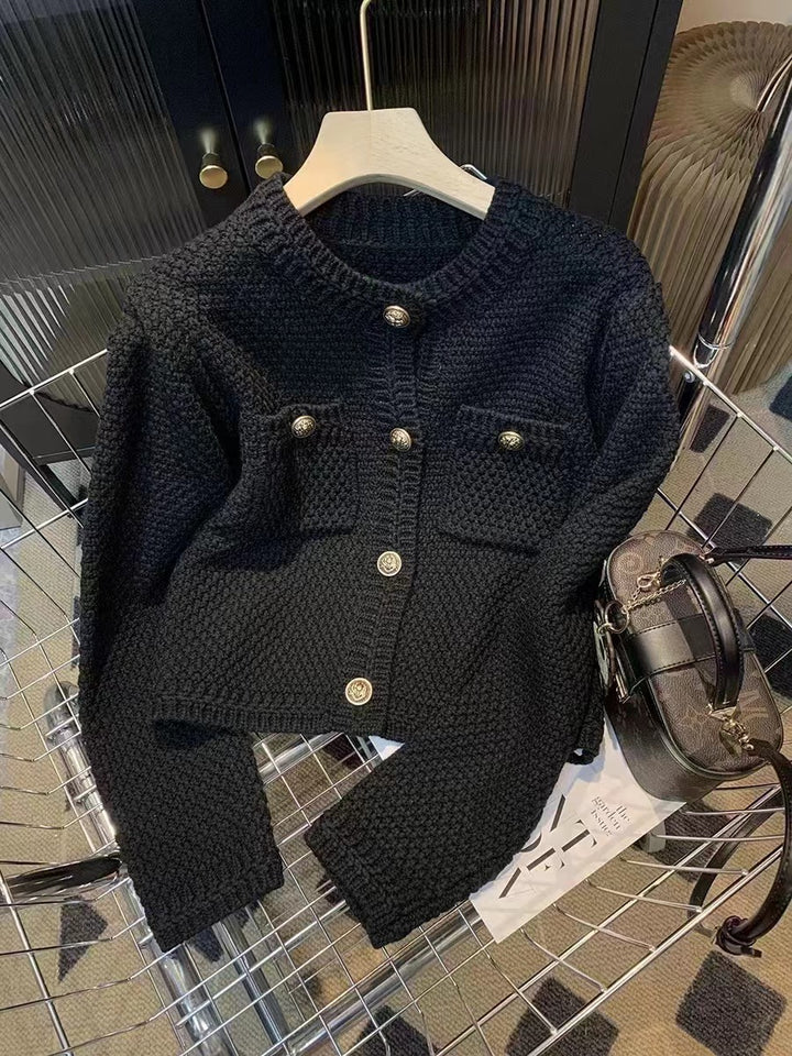 Dame cardigan med dekorative knapper og integrerede lommer Stilla