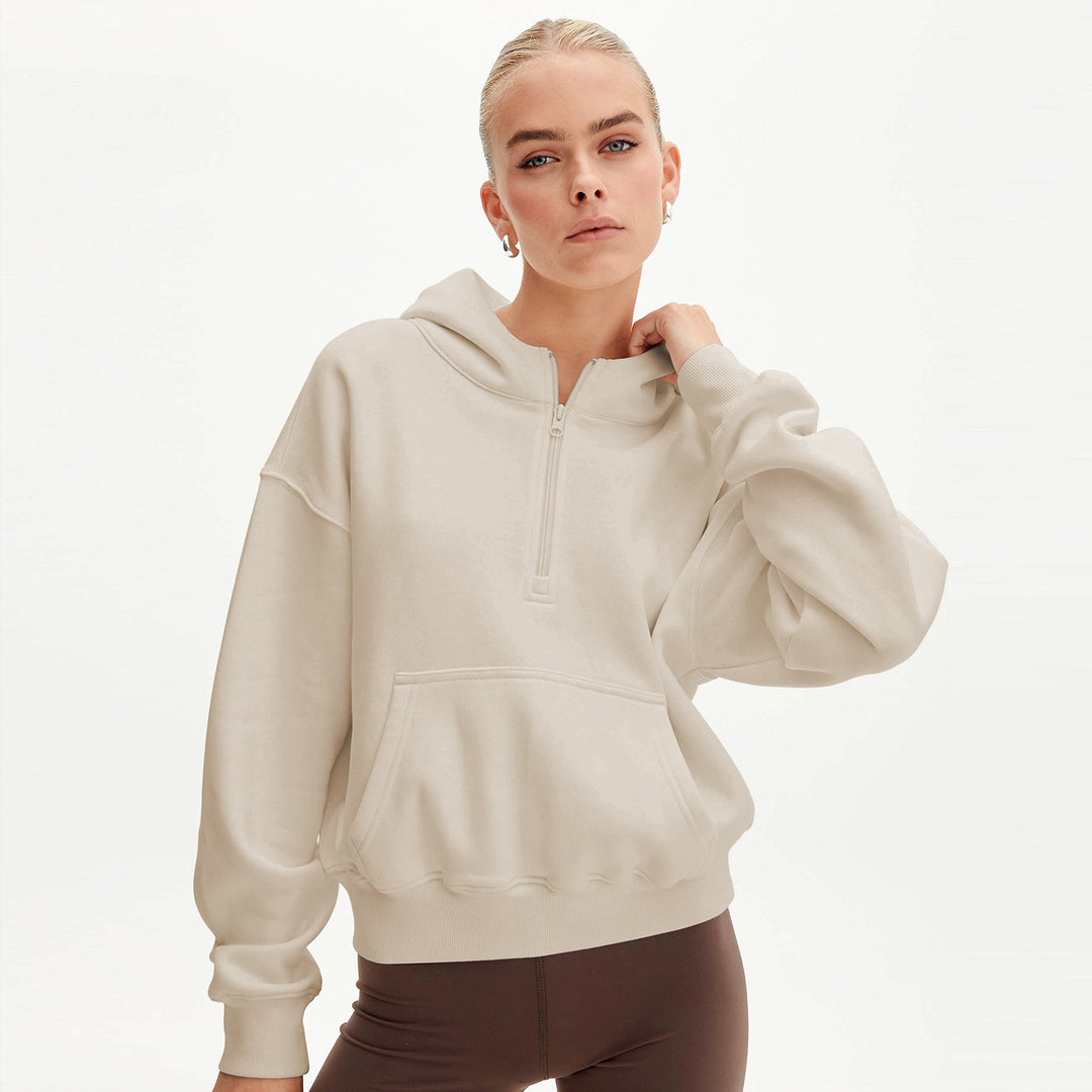 Dame hoodie med halv lynlås og oversized fit Stilla