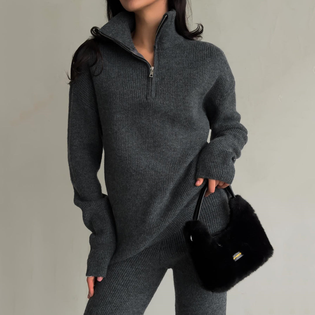 Kvinders komfortable strikket pullover med halv lynlås og ribbet design Skovae