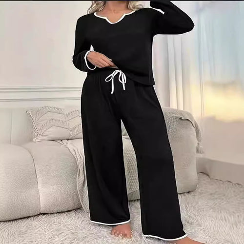 Dame fritids-loungewear-sæt med elegant V-udskæring og bredt ben Stilla
