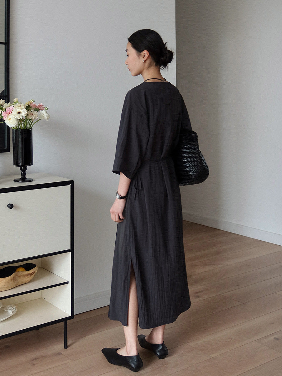 Dame moderne skjortekjole med elegant indpakningsdesign og knapdetaljer Stilla