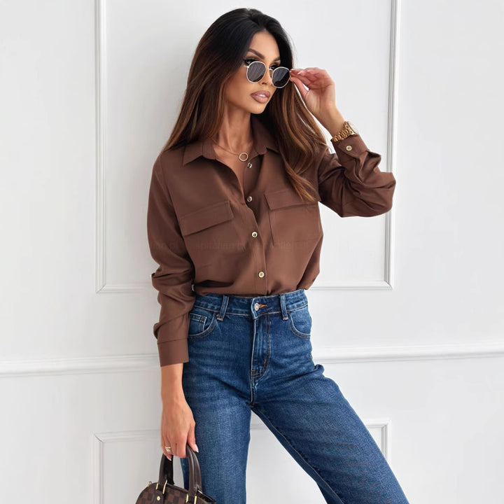Dame elegant bluse med brystlommer og knaplukning Stilla