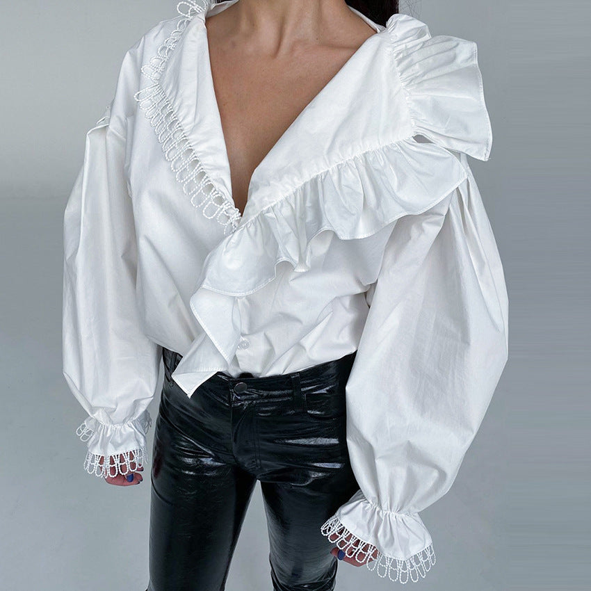Damebluse med voluminøse flæsedetaljer og elegante ærmer Stilla