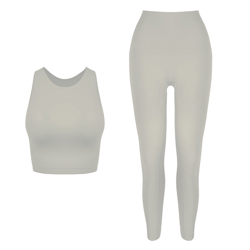 Dame sporty sæt i elastisk materiale med højtaljede leggings og tanktop Stilla